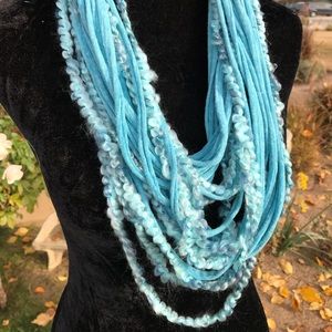 Multi textured knotted strands infinity scarf